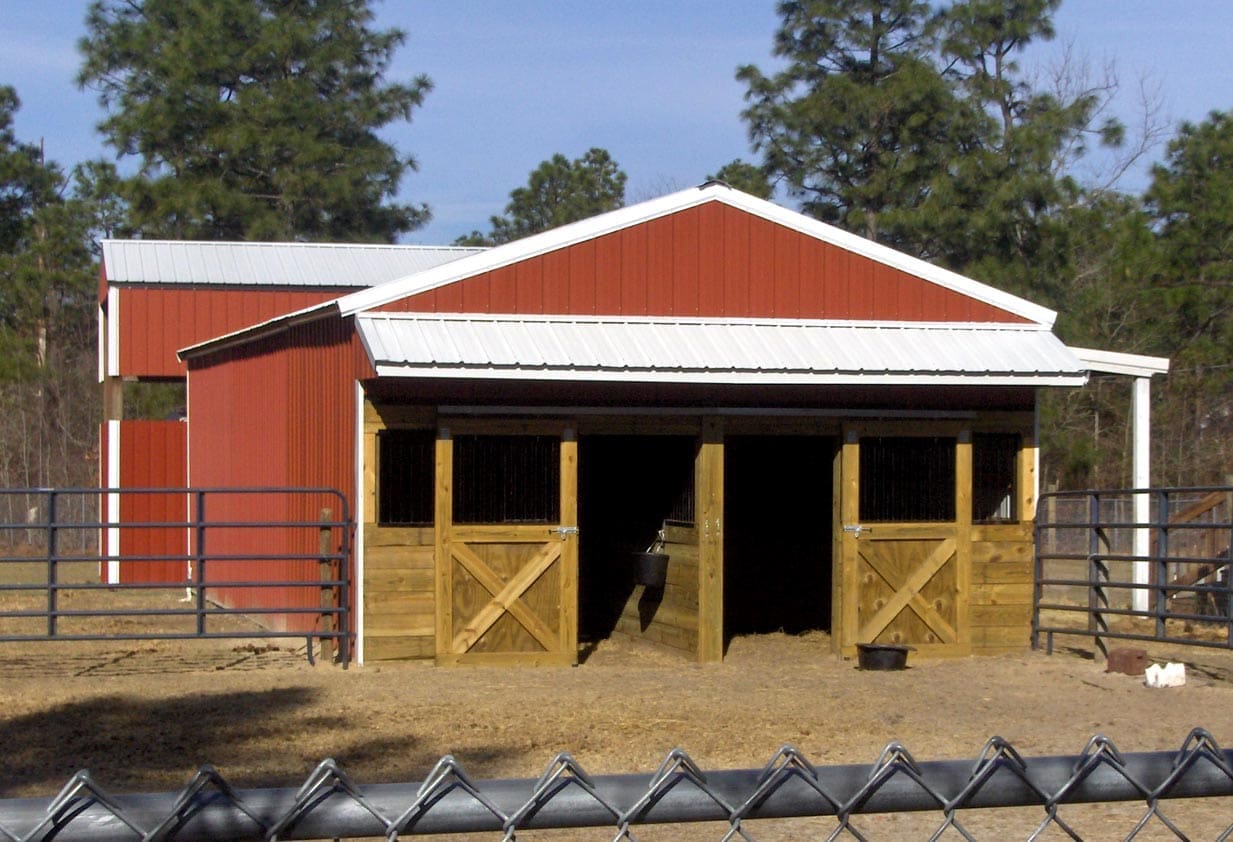 A Quality Pole Building - red barn with white roof | Gilbert, SC